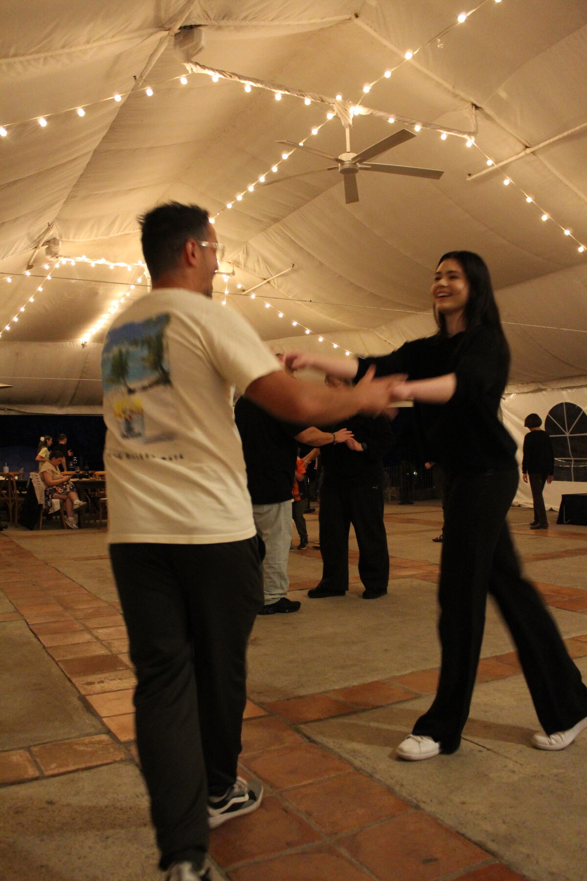 Students dancing together at a Leva Dance Club social night